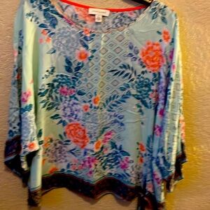 Pale aqua top with peach flowers ties on left side